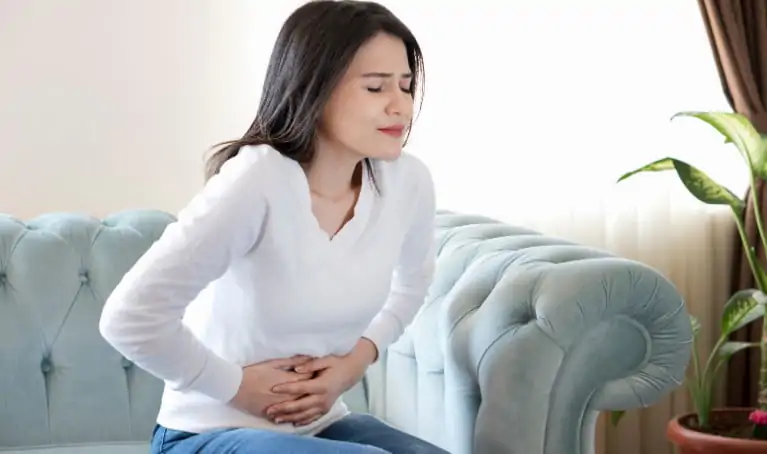 Young Woman With Stomach Pain
